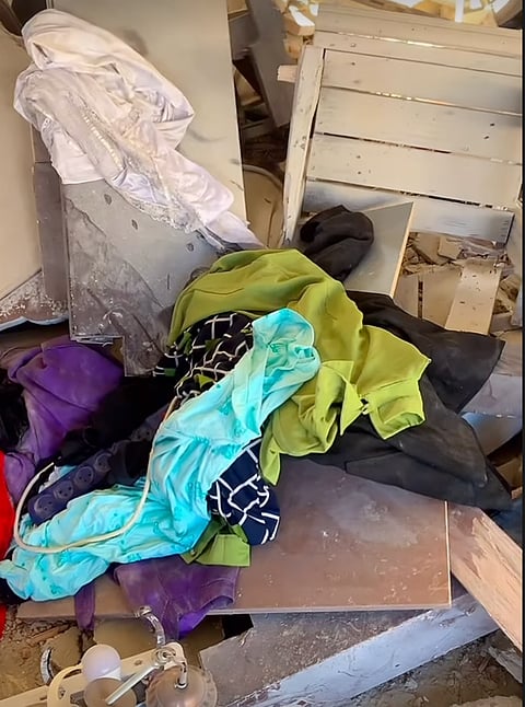 Clothes pulled out from under the debris
