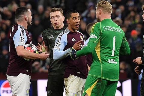Champions League 2024-25: Aston Villa's Youri Tielemans speaks with Celtic's goalkeeper Kasper Schmeichel