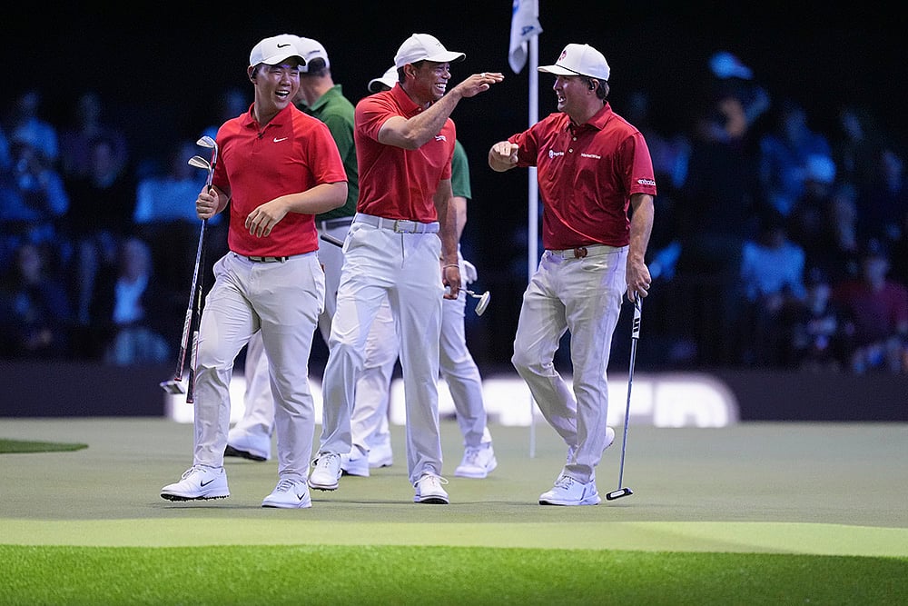 | Photo: AP/Rebecca Blackwell :  TGL: Jupiter Links Golf Club players, from left, Tom Kim, Tiger Woods, and Kevin Kisner 