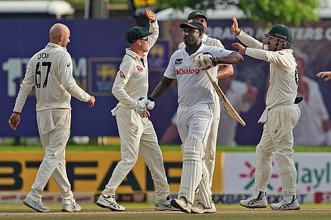 SL vs AUS 1st Test Day 2: Nathan Lyon and teammates celebrates the wicket of Sri Lanka's Angelo Mathews