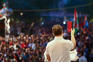 | Photo: AICC via PTI : Rahul Gandhi addresses a public meeting at Patparganj