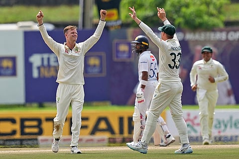SL vs AUS 1st Test Day 3: Australia's Matthew Kuhnemann celebrates the wicket of Sri Lanka's Dhananjaya de Silva