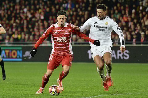 Champions League 2024-25: Brest's Romain Faivre challenges for the ball with Real Madrid's Jude Bellingham