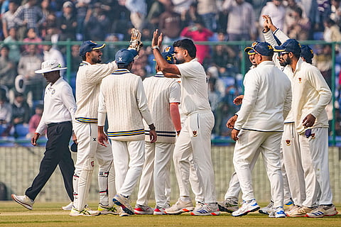 Ranji Trophy, Delhi vs Railways-Day 2: Railways' Himanshu Sangwan celebrates after taking the wicket of Delhi's Virat Kohli