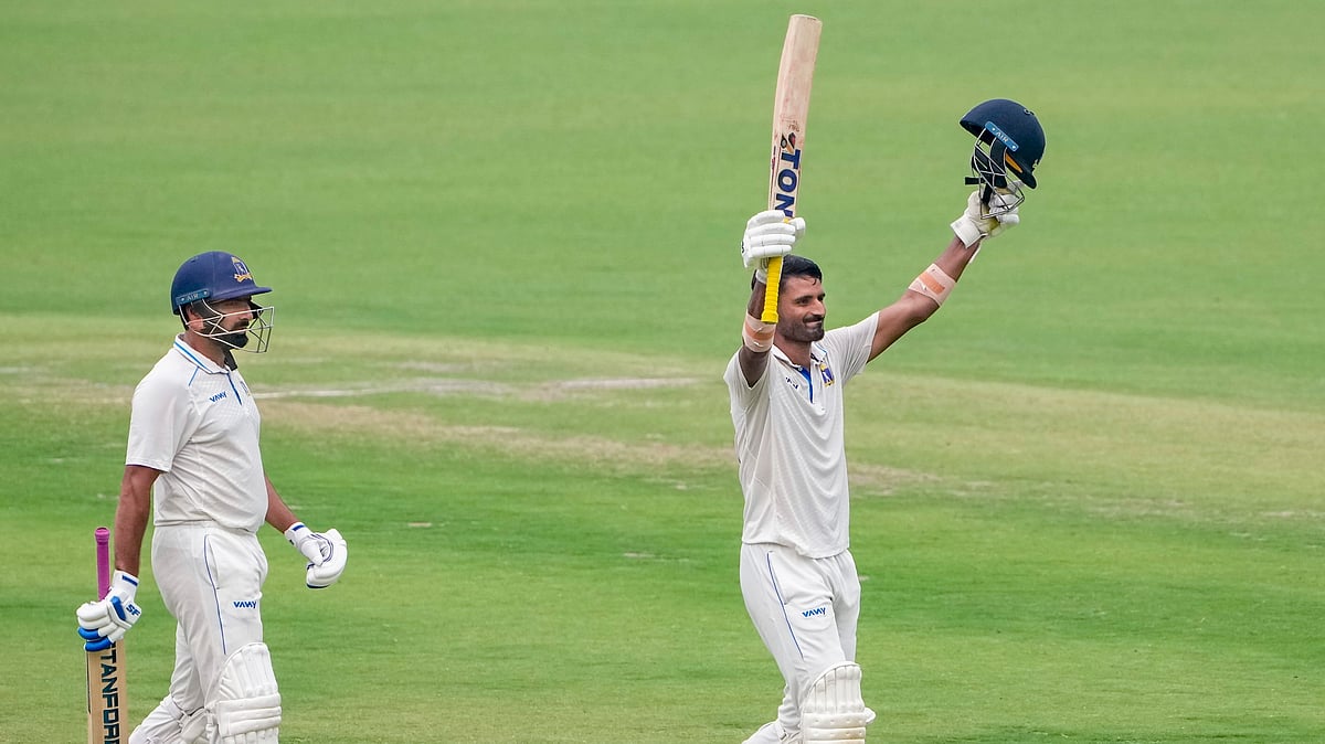 PTI : Bengal's Suraj Sindhu Jaiswal celebrates his century during the Ranji Trophy match against Punjab at Eden Gardens.
