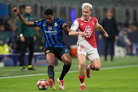 Champions League 2024-25: Monaco's Aleksandr Golovin and Inter Milan's Denzel Dumfries fight for the ball