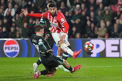 Champions League 2024-25: Liverpool's Cody Gakpo blocks the shot from PSV's Ismael Saibari