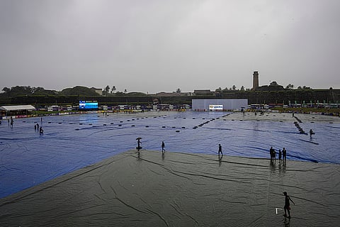 SL vs AUS 1st Test Day 3: Ground staff cover the pitch after rain interrupted the play