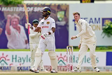 SL vs AUS 1st Test Day 3: Sri Lanka's Dinesh Chandimal celebrates his fifty runs