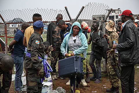 Congo conflict: M23 rebels escort surrendered government soldiers