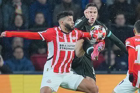 Champions League 2024-25: PSV's Ismael Saibari and Liverpool's Federico Chiesa fight for the ball