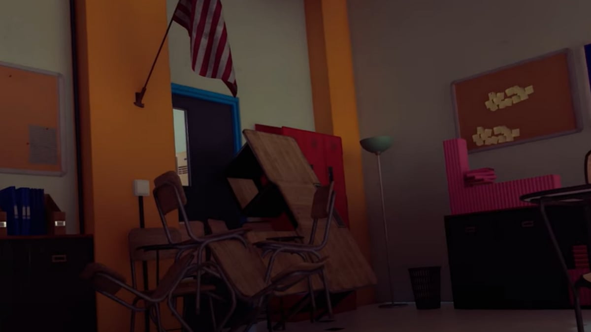 | Photo: The Final Exam/Youtube : A still from the video game shows desks and chairs stacked up against the door to block the shooter's entry. 