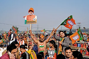 | Photo: Suresh K. Pandey : Poll Glimpses: BJP supporters at Prime Minister Narendra Modi’s rally in East Delhi