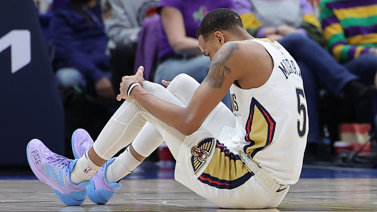 Dejounte Murray #5 of the New Orleans Pelicans leaves the game with an injury during the first half against the Boston Celtics at the Smoothie King Center on January 31, 2025 in New Orleans, Louisiana.