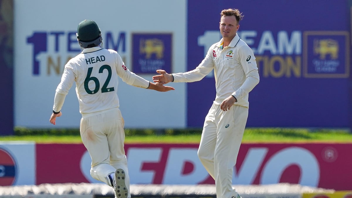 AP : Australia's Matthew Kuhnemann celebrates the wicket of Sri Lanka's Kusal Mendis during day four of the first test cricket match between Sri Lanka and Australia in Galle