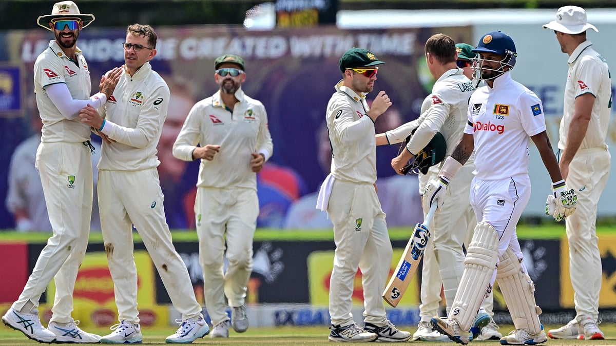 Todd Murphy celebrates a wicket