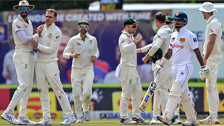 Todd Murphy celebrates a wicket - null