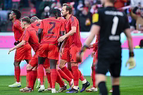 Bundesliga 2024-25: Bayern's Harry Kane, centre, celebrates after scoring his side's third goal