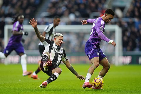 English Premier League 2024-25: Newcastle United's Bruno Guimaraes and Fulham's Antonee Robinson battle for the ball