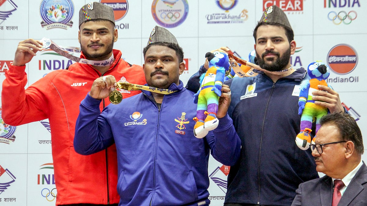 PTI : Gold medal winner Jagdish Vishwkarma, silver medalist Vaishnav Thakur and bronze medalist Harshit Sehrawat.
