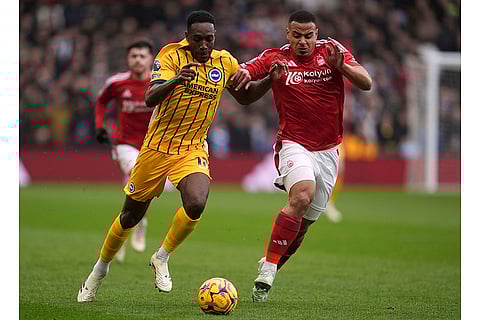 English Premier League: Brighto's Danny Welbeck and Nottingham Forest's Murillo battle for the ball