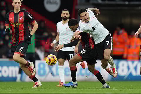 English Premier League 2024-25: Liverpool's Luis Diaz, right, challenges for the ball with Bournemouth's Tyler Adams