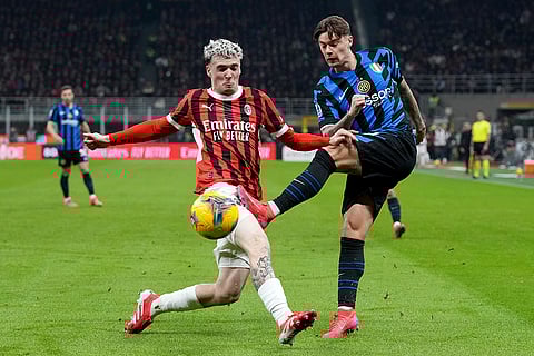 Serie A 2024-25: Inter Milan's Nicola Zalewxki fights for the ball with AC Milan's Alex Jimenez
