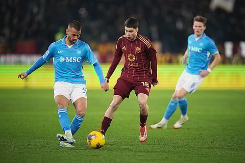 Serie A 2024-25: Napoli's Leonardo Spinazzola, left, and Roma's Matias Soule