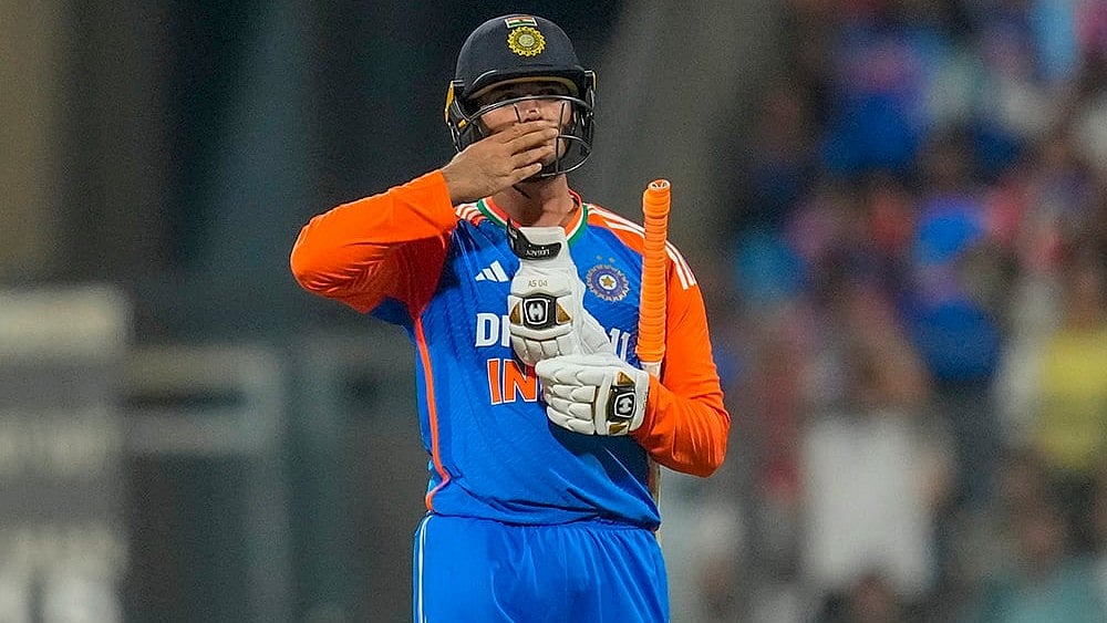 | Photo: AP/Rafiq Maqbool : IND vs ENG 5th T20I: India's Abhishek Sharma blows a kiss as he celebrates after scoring fifty