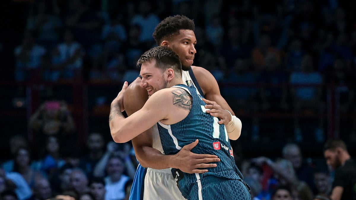 Luka Doncic and Giannis Antetokounmpo embrace during an NBA clash