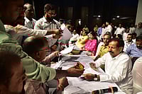 | Photo: PTI; Repesentative image : Ganesh Naik sitting at the right in the picture. 
