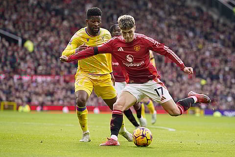 English Premier League 2024-25: Manchester United's Alejandro Garnacho is challenged by Crystal Palace's Jefferson Lerma