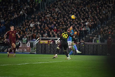 Serie A 2024-25: Napoli's Leonardo Spinazzola, right, scores the opening goal past Roma's goalkeeper Mile Svilar