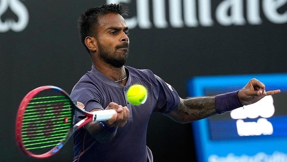 Photo: AP/Manish Swarup : Indian tennis ace Sumit Nagal in action.