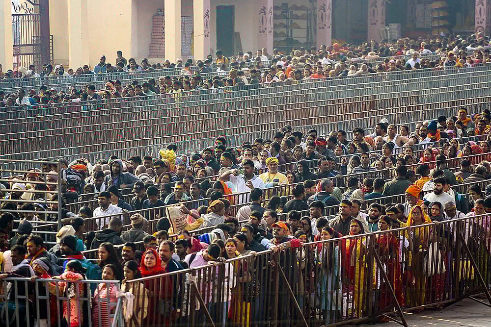 | Photo: PTI : Devotees at Shri Bade Hanuman JI temple