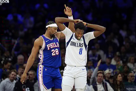 NBA 2024-25: 76ers' Guerschon Yabusele, left, and Mavericks' Olivier-Maxence Prosper react