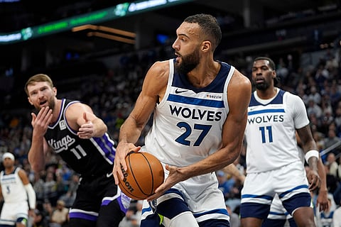 NBA 2024-25: Timberwolves center Rudy Gobert (27) grabs a rebound