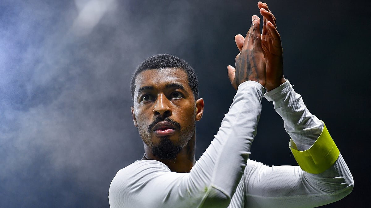 Presnel Kimpembe applauds PSG's fans after Tuesday's game.
