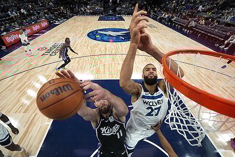 NBA 2024-25: Kings forward Domantas Sabonis (11) and Timberwolves center Rudy Gobert