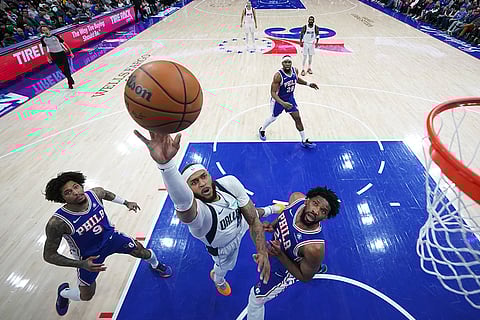 NBA 2024-25: Mavericks' Daniel Gafford goes up for a shot