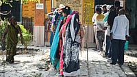 PTI : People wait to cast their votes during the Milkipur Assembly by-election, in Ayodhya district, Wednesday, Feb. 5, 2025. 