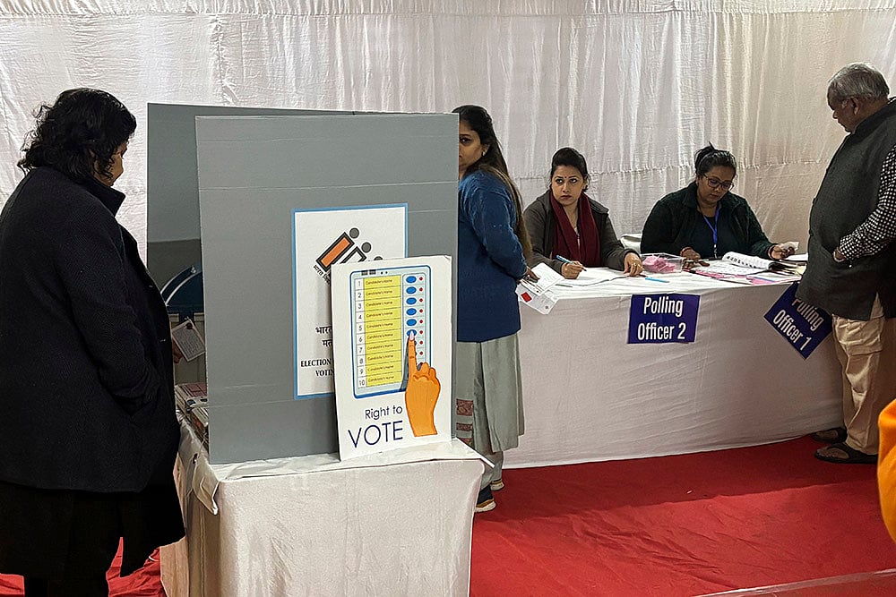 | Photo: AP/Shonal Ganguly : Delhi Elections 2025 Voting: People cast their votes