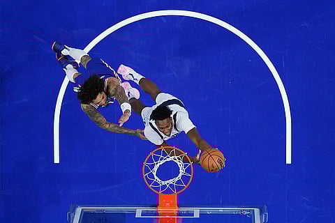 NBA 2024-25: Mavericks' Olivier-Maxence Prosper goes up for a shot