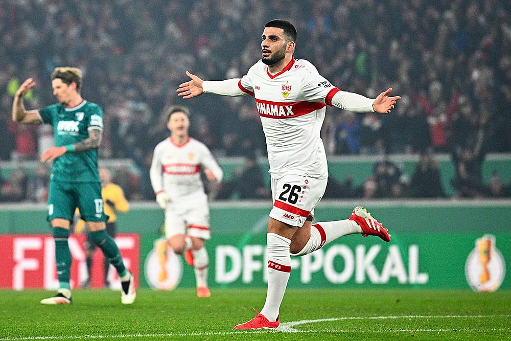 | Photo: Tom Weller/dpa via AP : DFB-Pokal, VfB Stuttgart and FC Augsburg: Stuttgart's Deniz Undav celebrates after scoring the opening goal