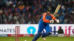 AP Photo/Rafiq Maqbool : India's Abhishek Sharma bats during the fourth T20 cricket match between England and India in Pune, India.