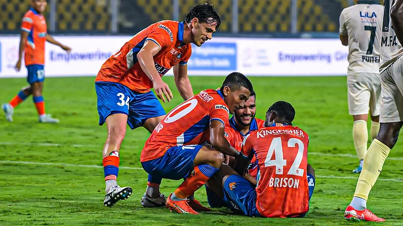 FC Goa celebrate a goal against Odisha FC.