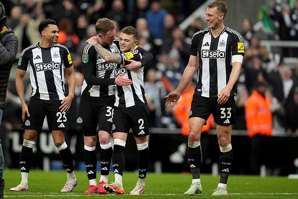 | Photo: AP/Jon Super : EFL Cup Semi-final: Newcastle players celebrate after winning the match