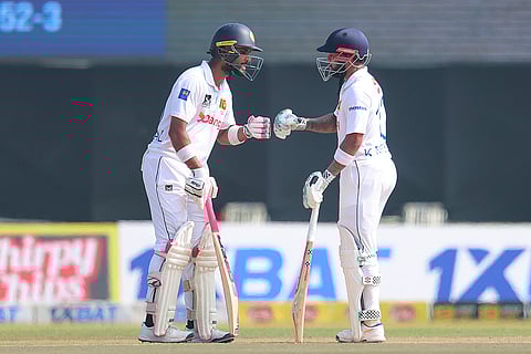SL vs AUS 2nd Test Day 1: Sri Lanka's Dinesh Chandimal, left, and Kusal Mendis bump fists