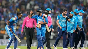 AP Photo/Aijaz Rahi : India's Hardik Pandya, left, shares a laugh with batting partner Ravindra Jadeja after their win in the first one day international cricket match against England at Vidarbha Stadium in Nagpur.