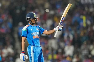 | Photo: AP/Aijaz Rahi : India's Shubman Gill celebrates after scoring fifty runs